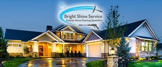 Promotional banner for bright shine service, featuring a large, well-lit and clean house at dusk with the company's logo and tagline "exterior home cleaning specialists" across the top.